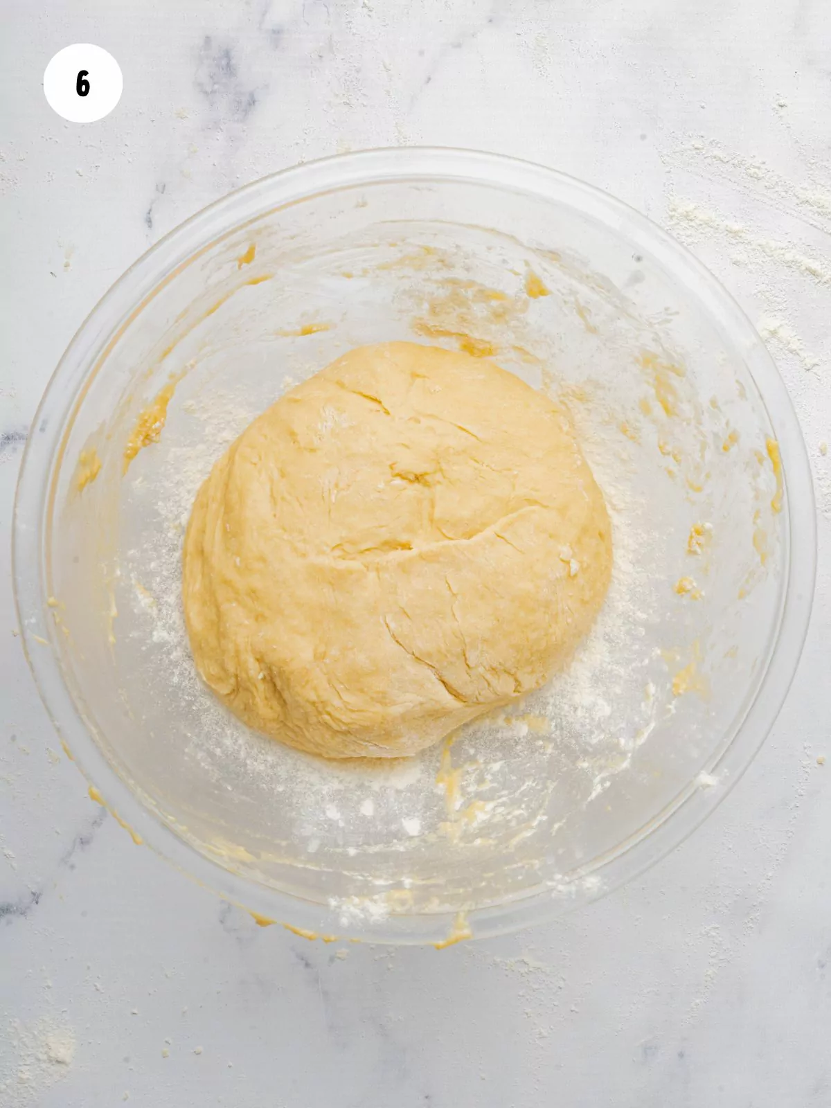 ball of smooth dough in mixing bowl