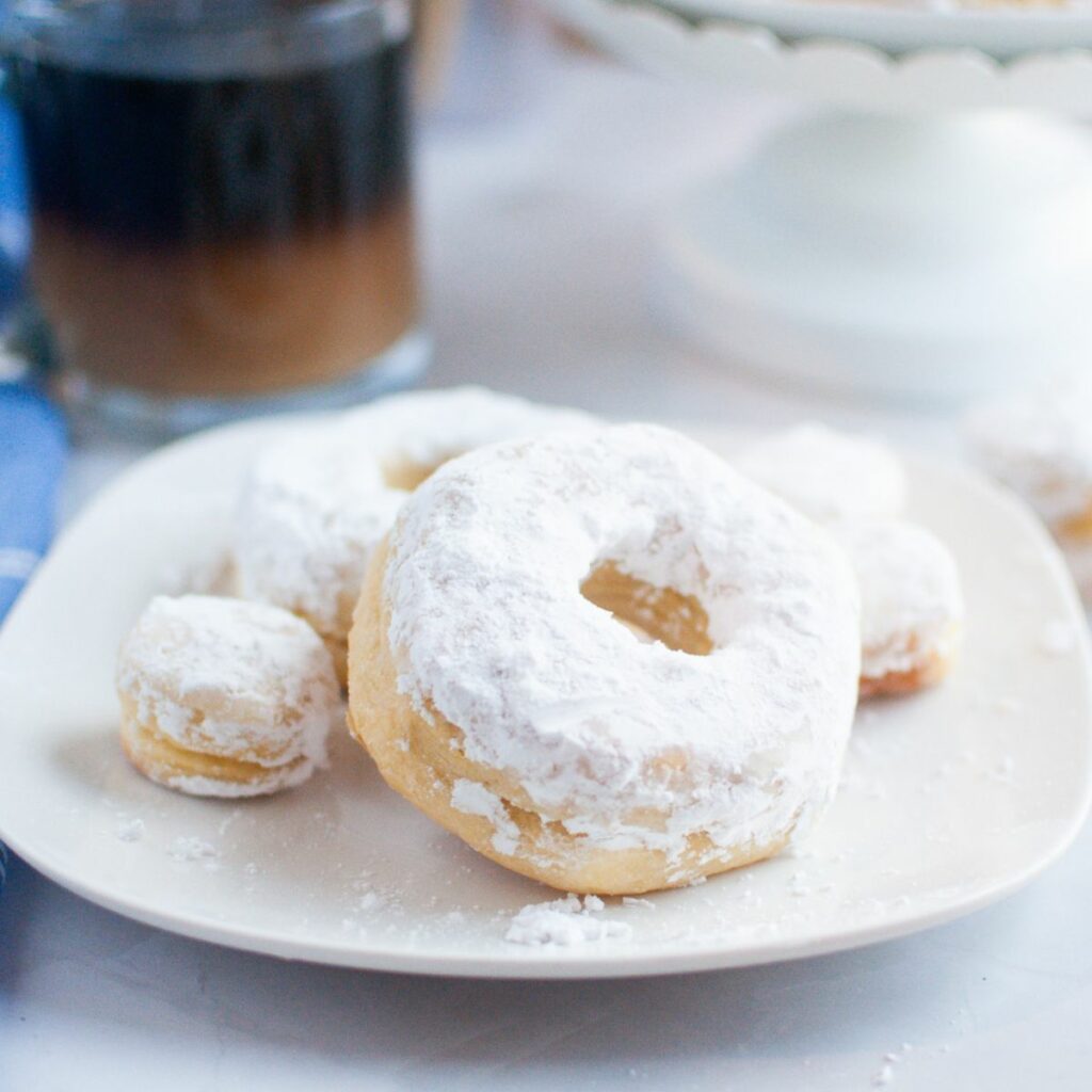 Air Fryer Biscuit Donuts and donut holes with Powdered Sugar