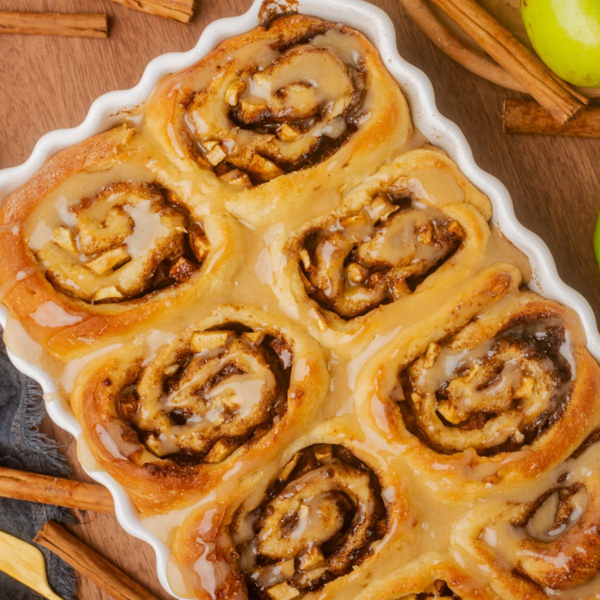 Apple Filled Cinnamon Rolls with Brown Butter Maple Icing