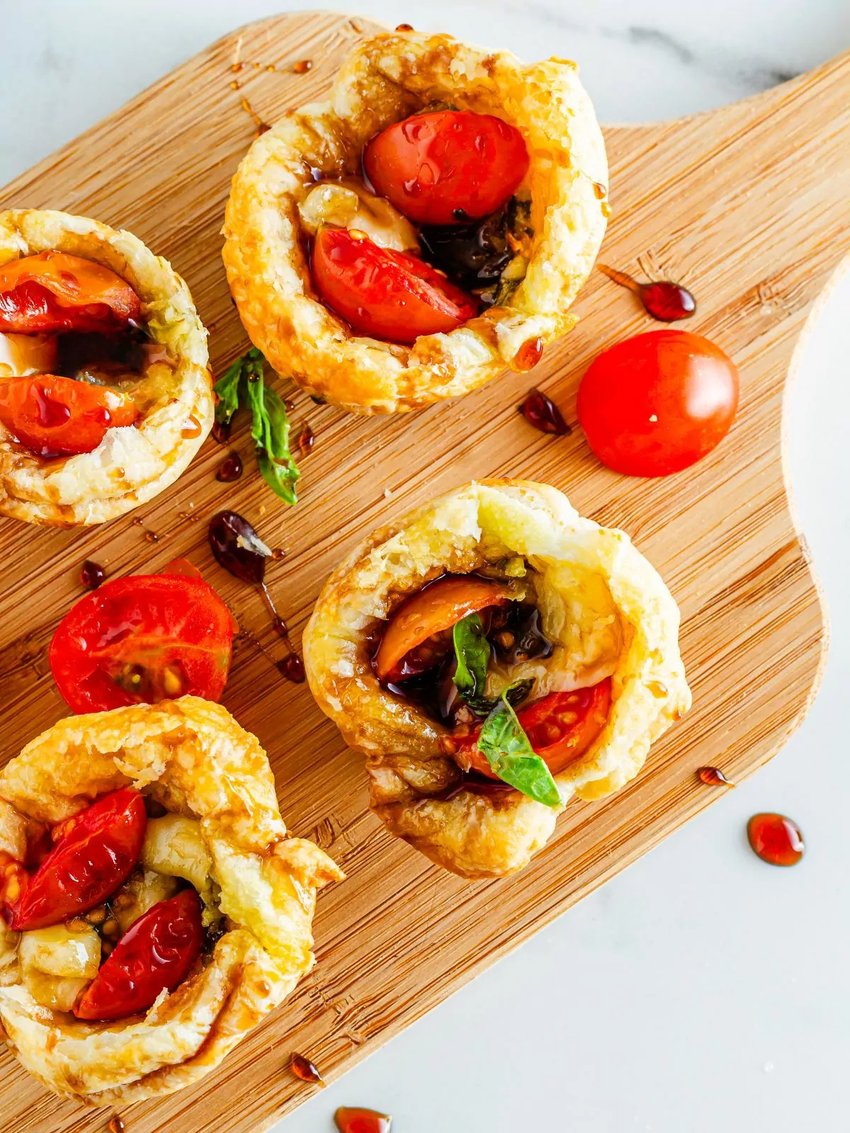 Caprese Puff Pastry Bites with fresh balsamic drizzle