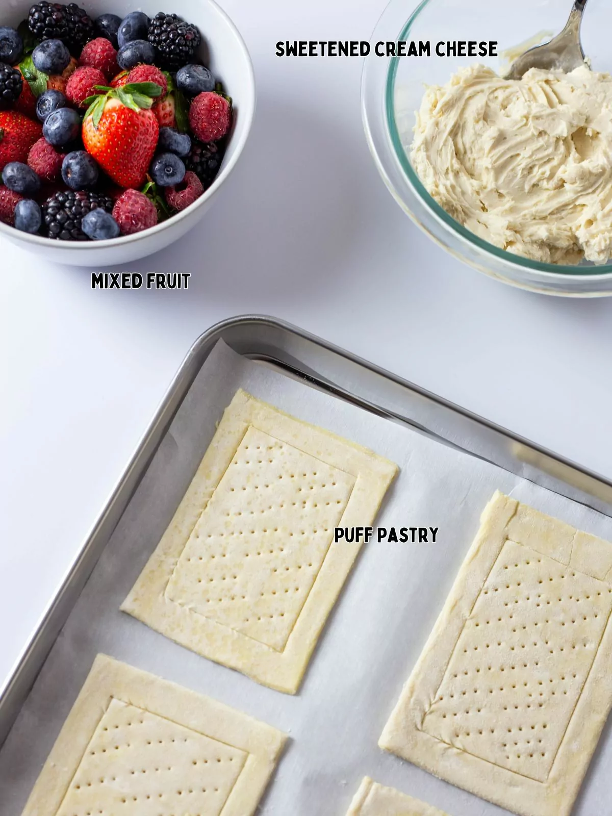 Ingredients for fruit and puff pastry squares.