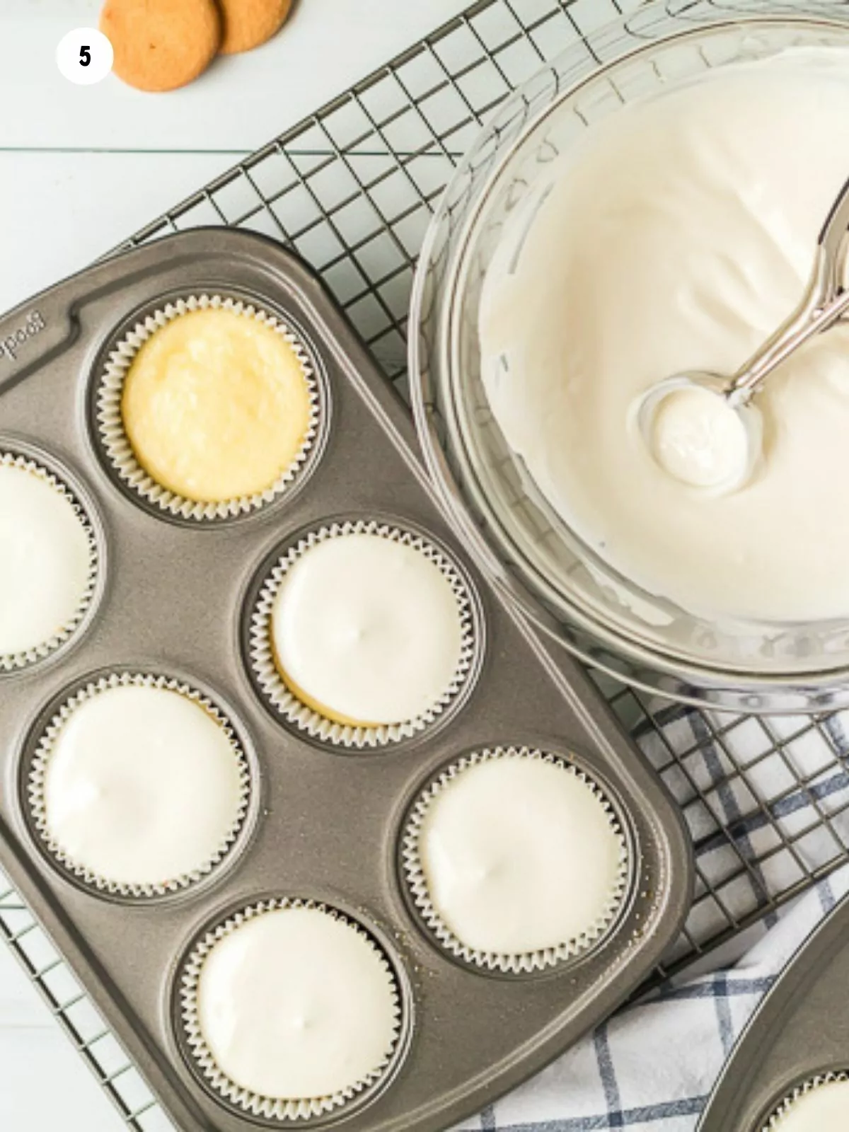 sour cream topping on top of baked cheesecakes.