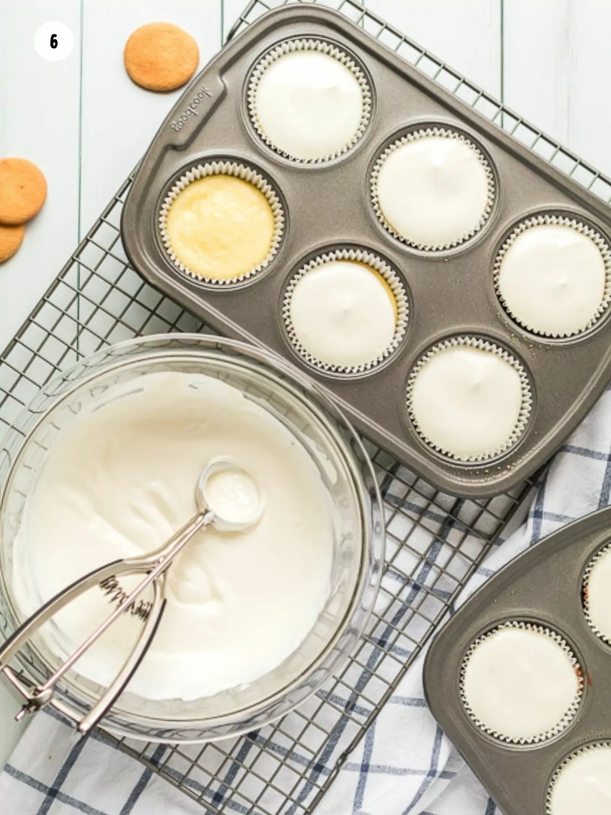 Add sour cream topping to baked cheesecakes.