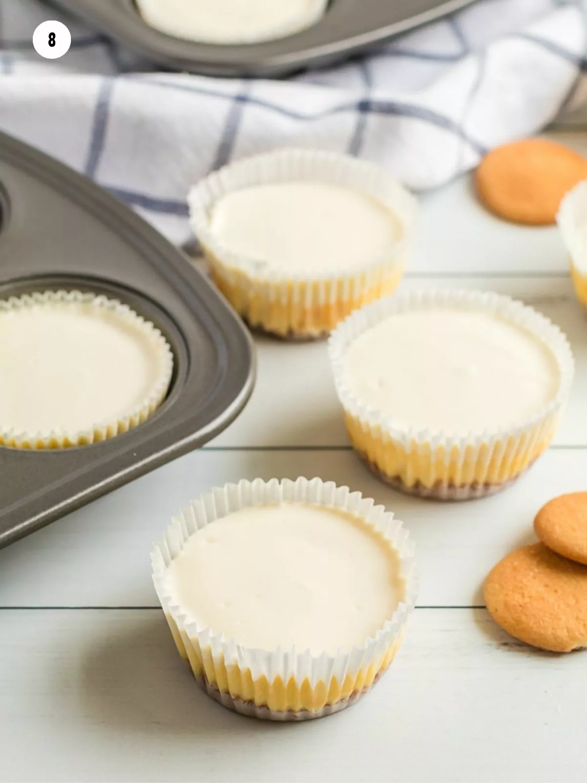 baked cupcakes on cutting board and in muffin pan.