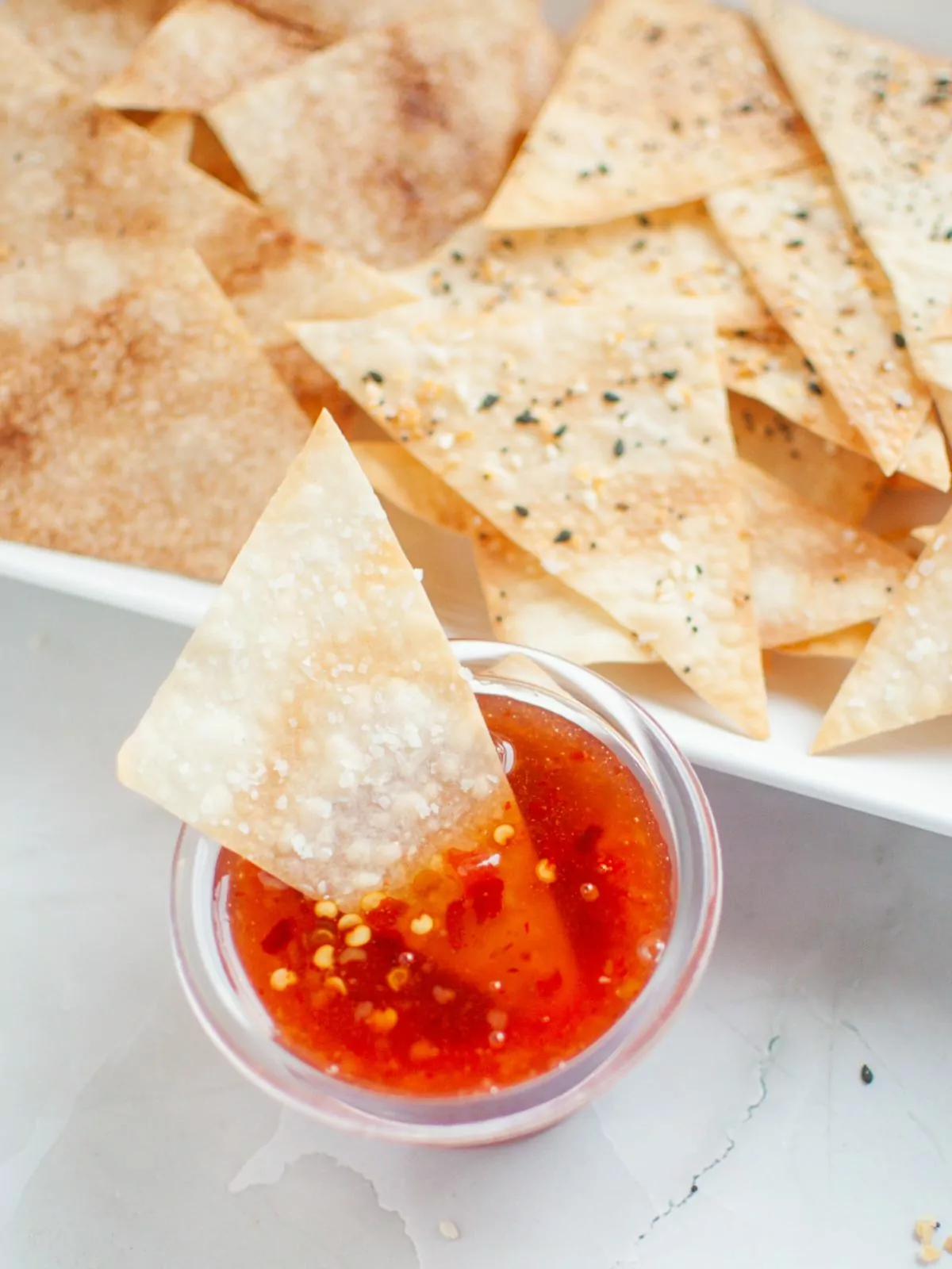 chips dipped in sweet and sour sauce