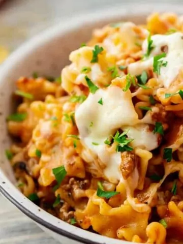 bowl of skillet lasagna with fresh herbs MSN.