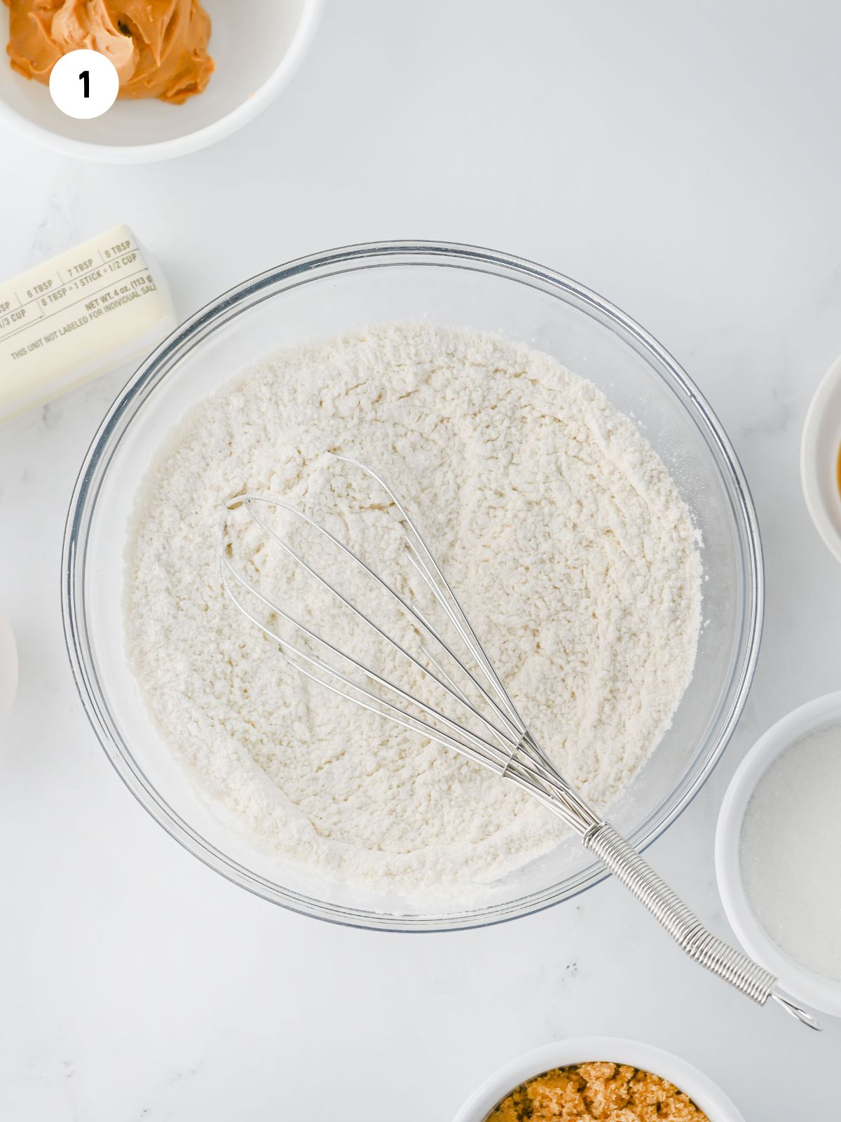 whisk in flour mixture in a mixing bowl