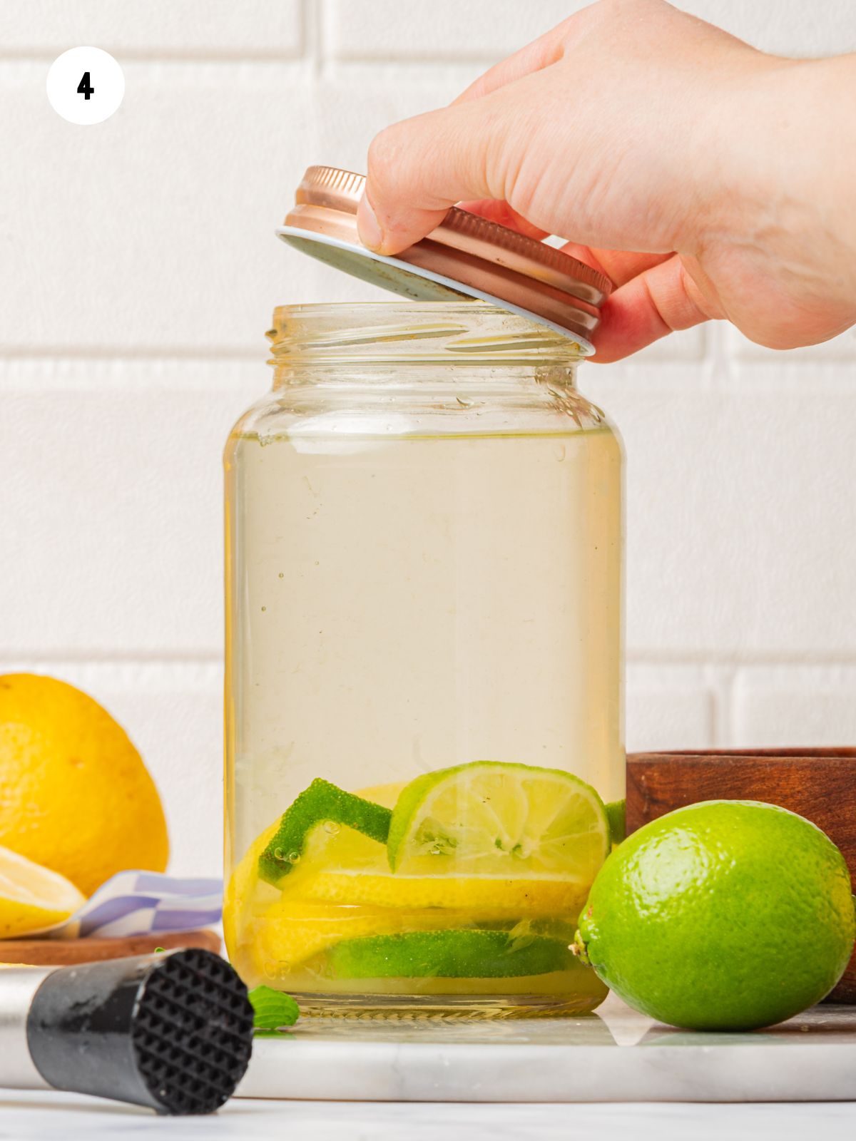 lid being screwed onto the jar