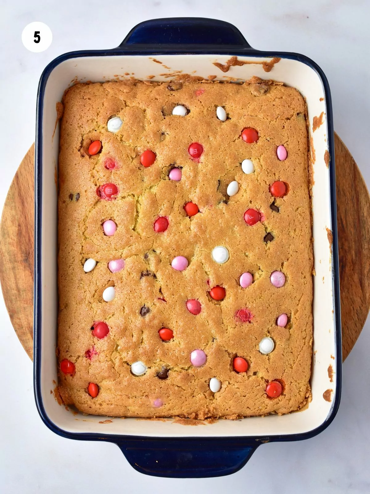 baked cookie bars with red white and pink M&M's