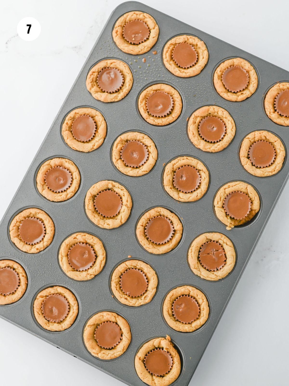 miniature peanut butter cups pressed into cookie cups