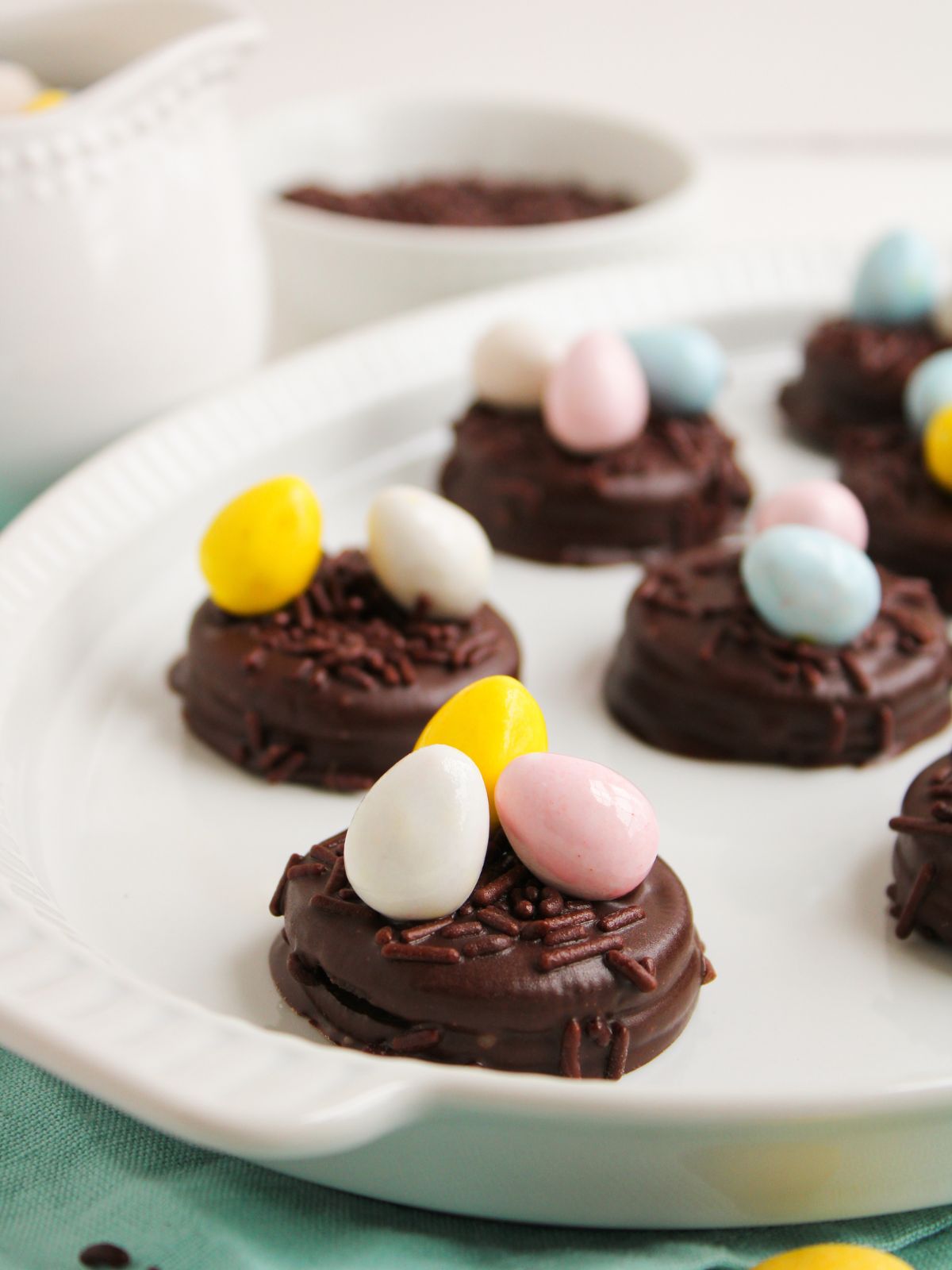 pastel mini chocoalte eggs on chocolate dipped oreos