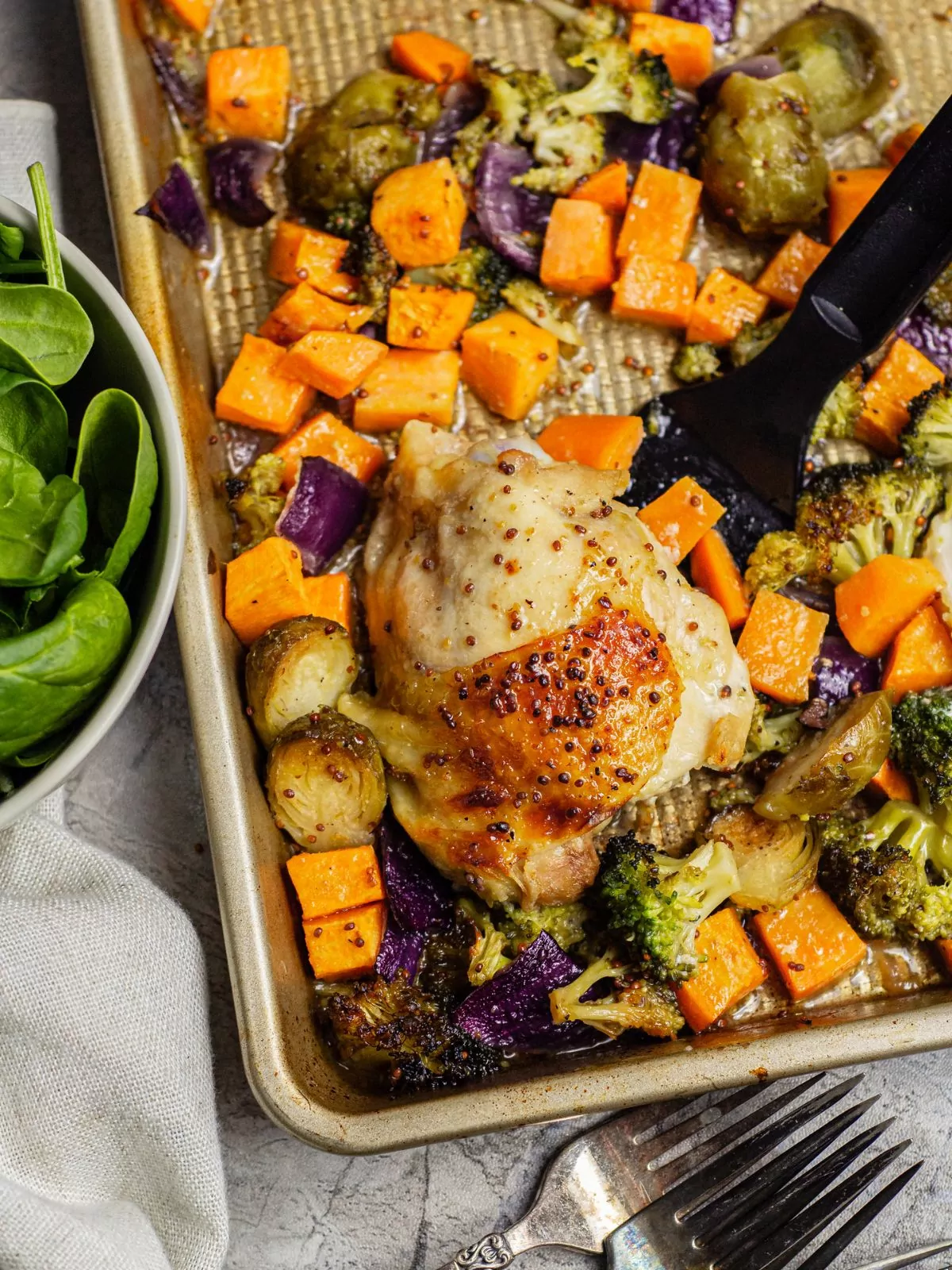 roasted chicken thighs and vegetables in a dijon mustard marinade