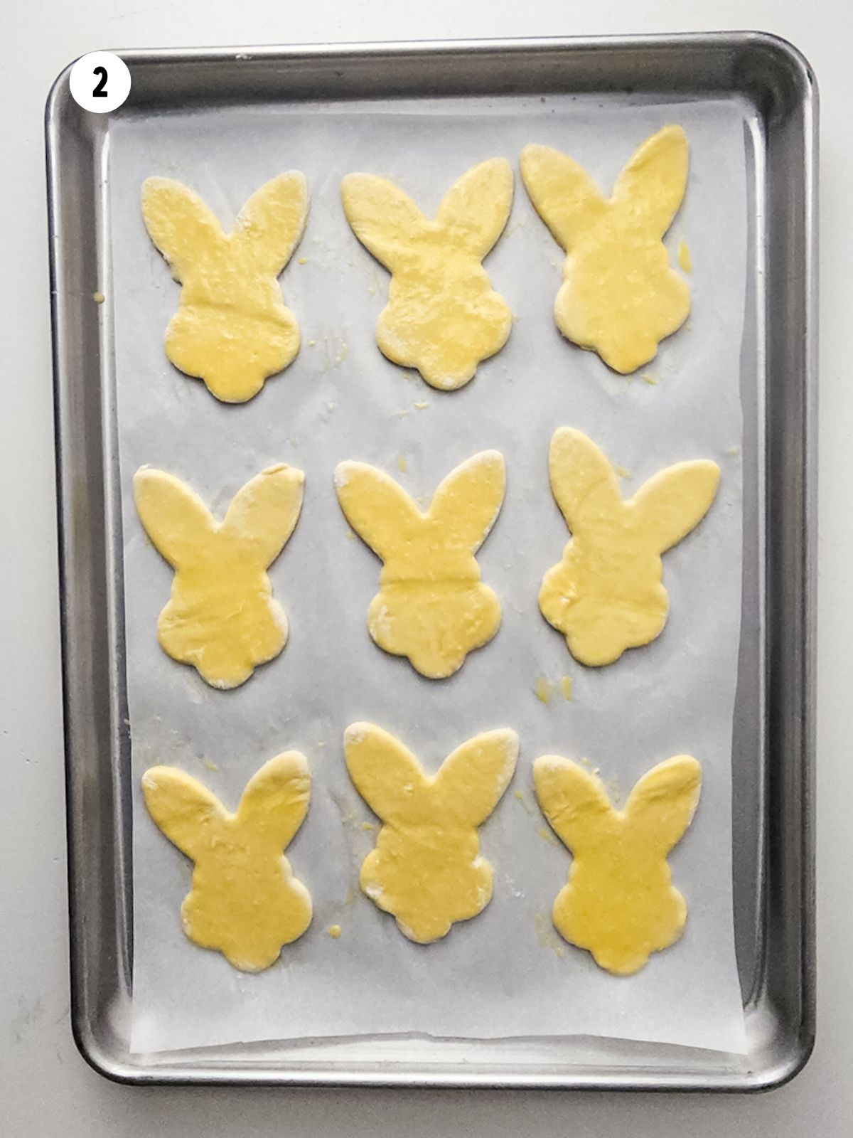bunny shape puff pastry brushed with egg wash