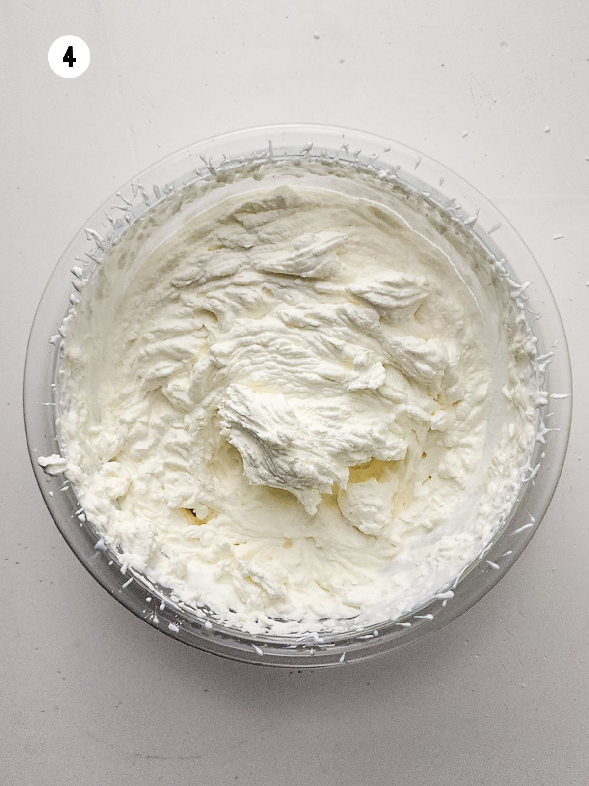 whipped cream in mixing bowl