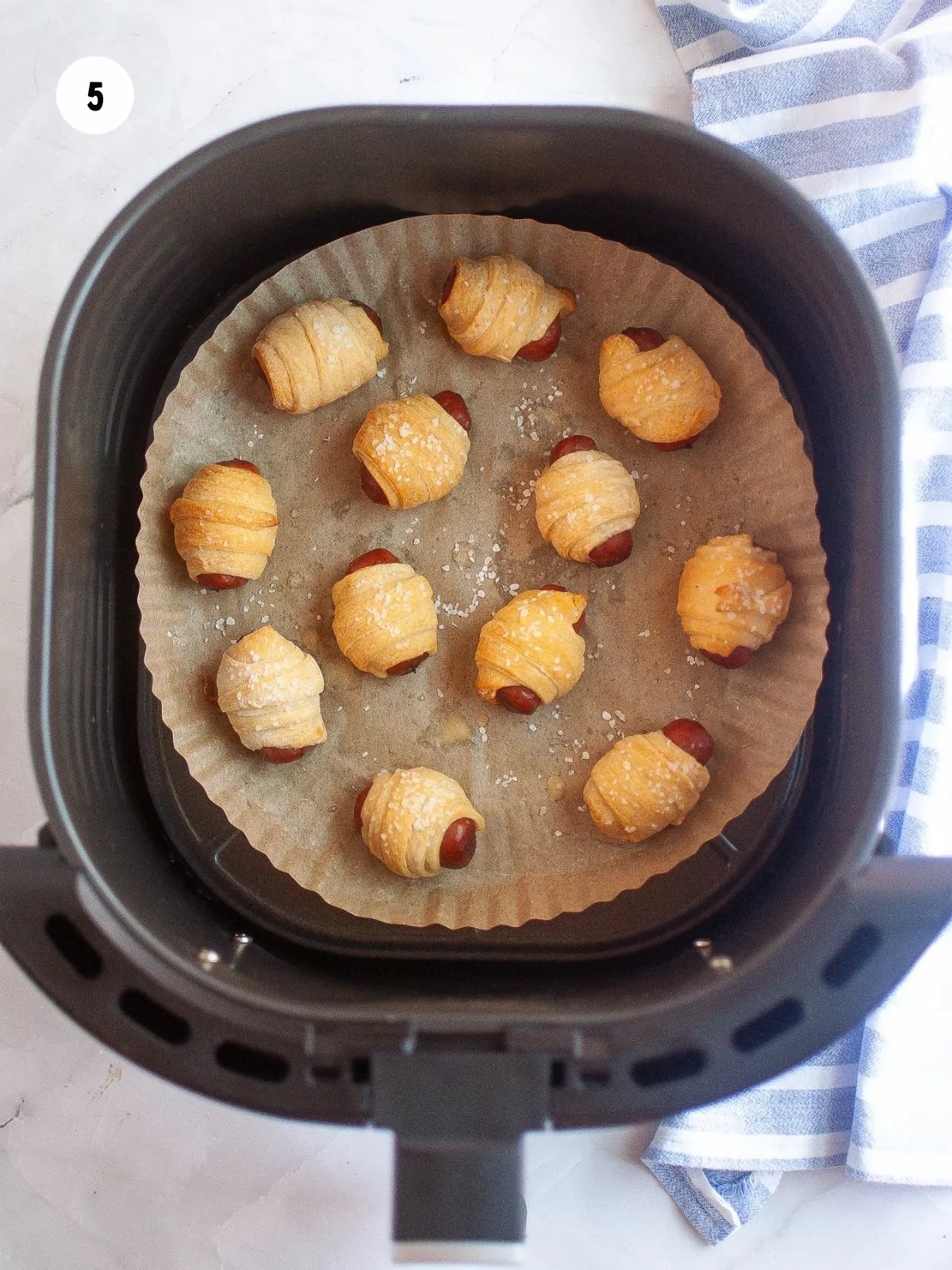 air fried pigs in a blanket in the air fryer basket