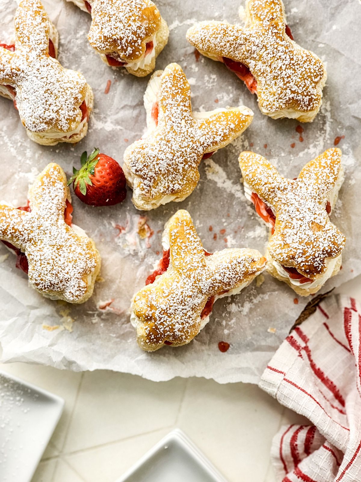 bunny shaped puff pastry filled with strawberries and whipped cream