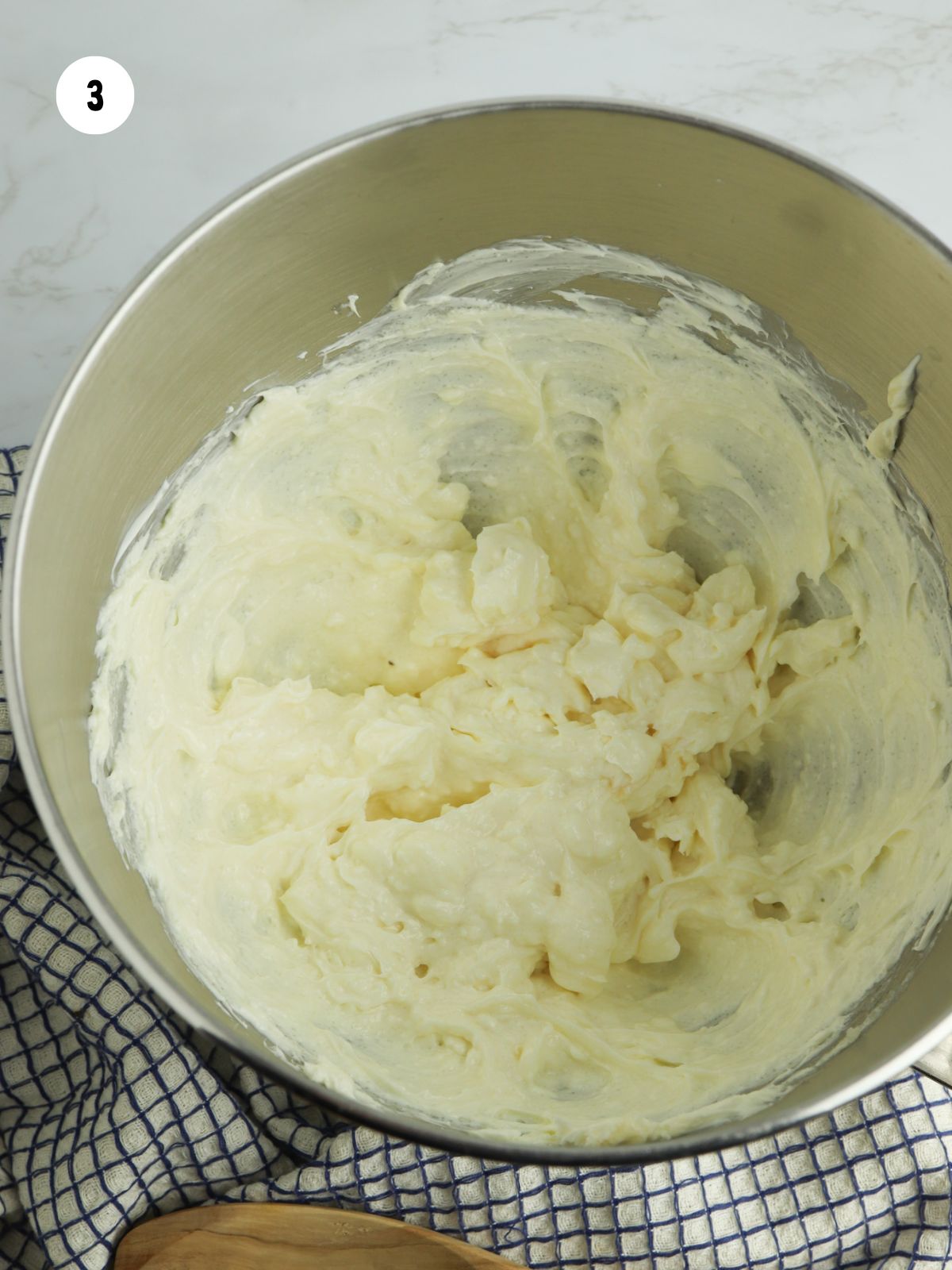 cream cheese beaten in stand mixer bowl