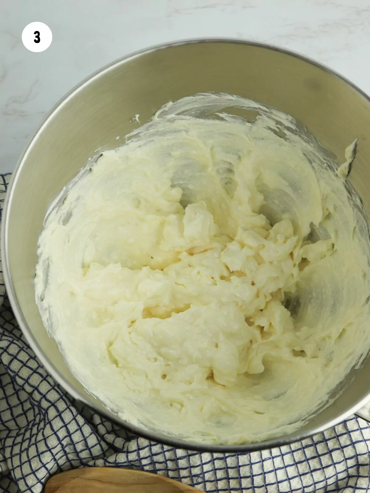 cream cheese beaten in stand mixer bowl