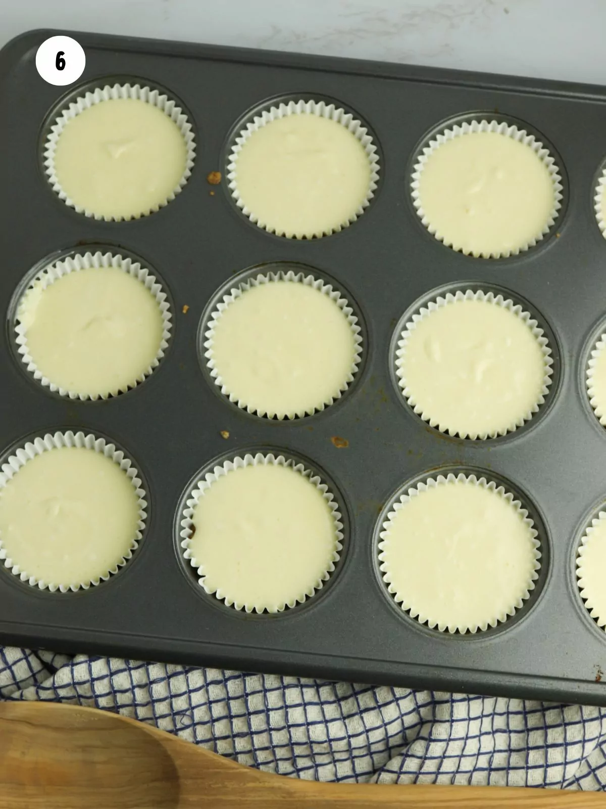 cheesecake batter added on top of crusts