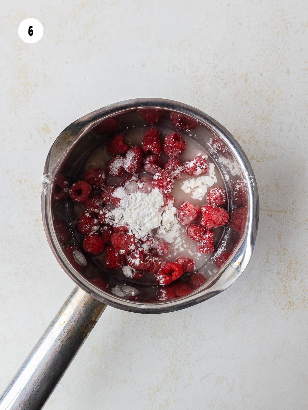 raspberries, cornstarch, and lemon juice in a saucepan