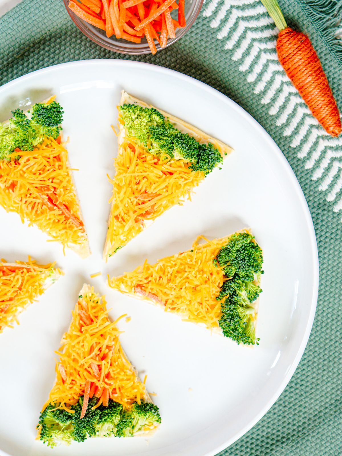 Easter Carrots Veggie Pizza on a white plate