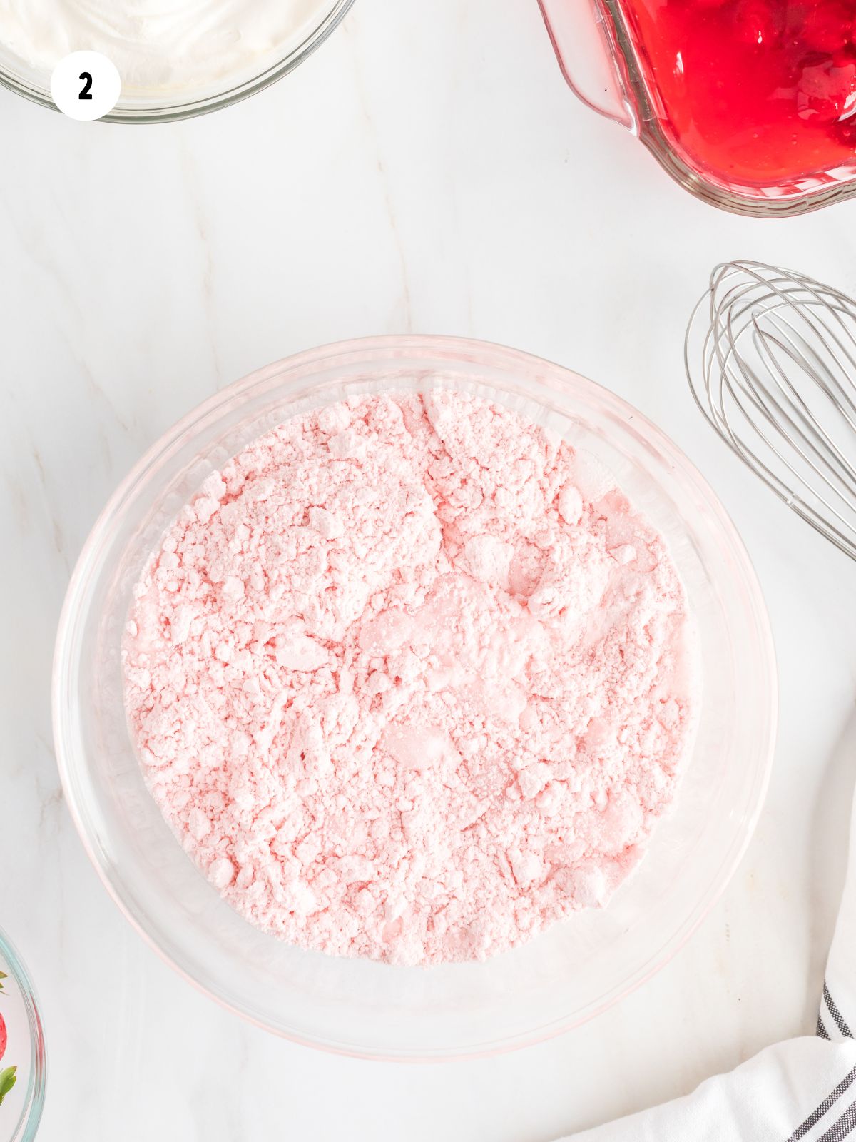 cream soda added into a bowl of cake mix