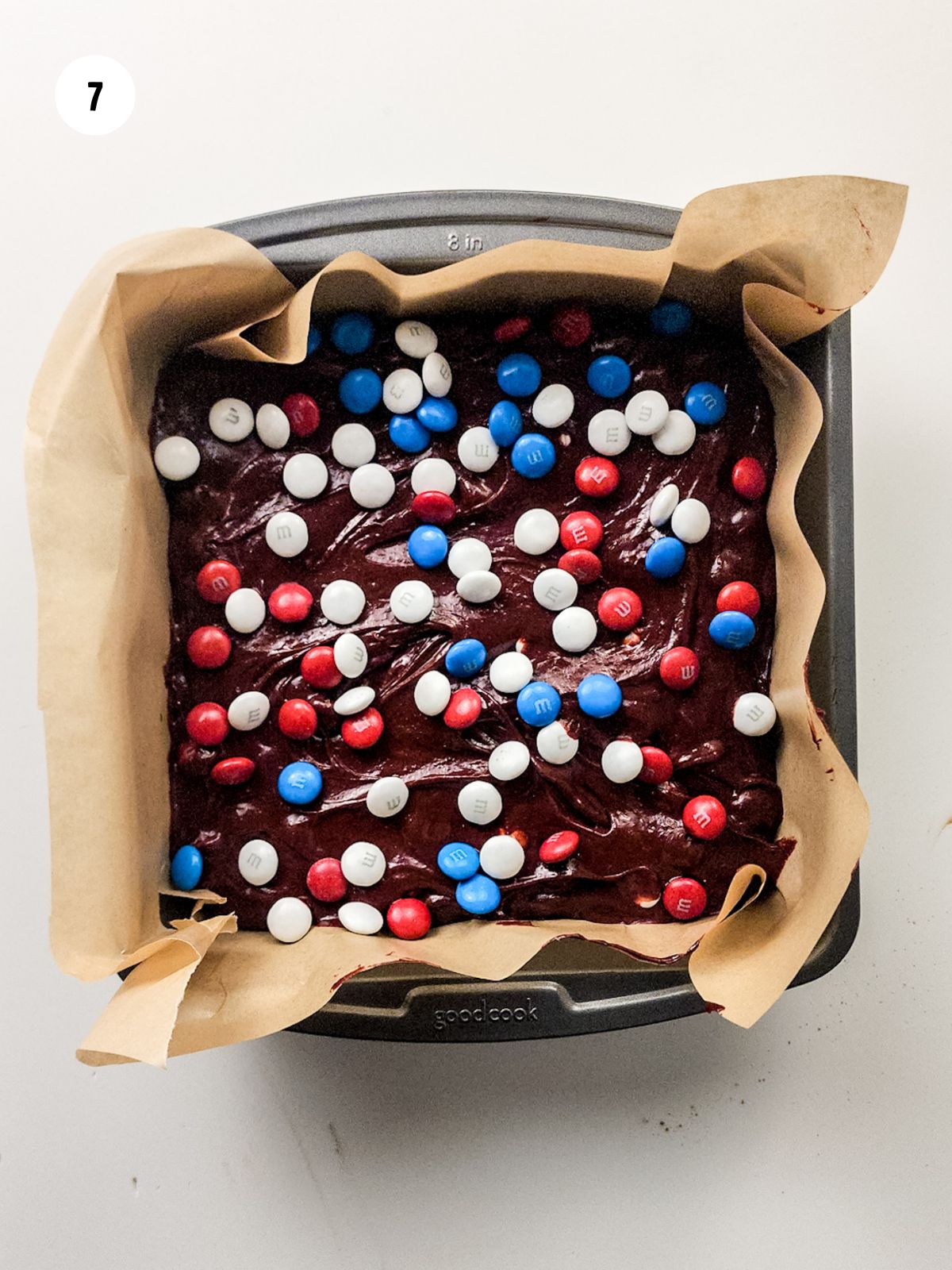 red white and blue m&m's added on top of the brownie batter
