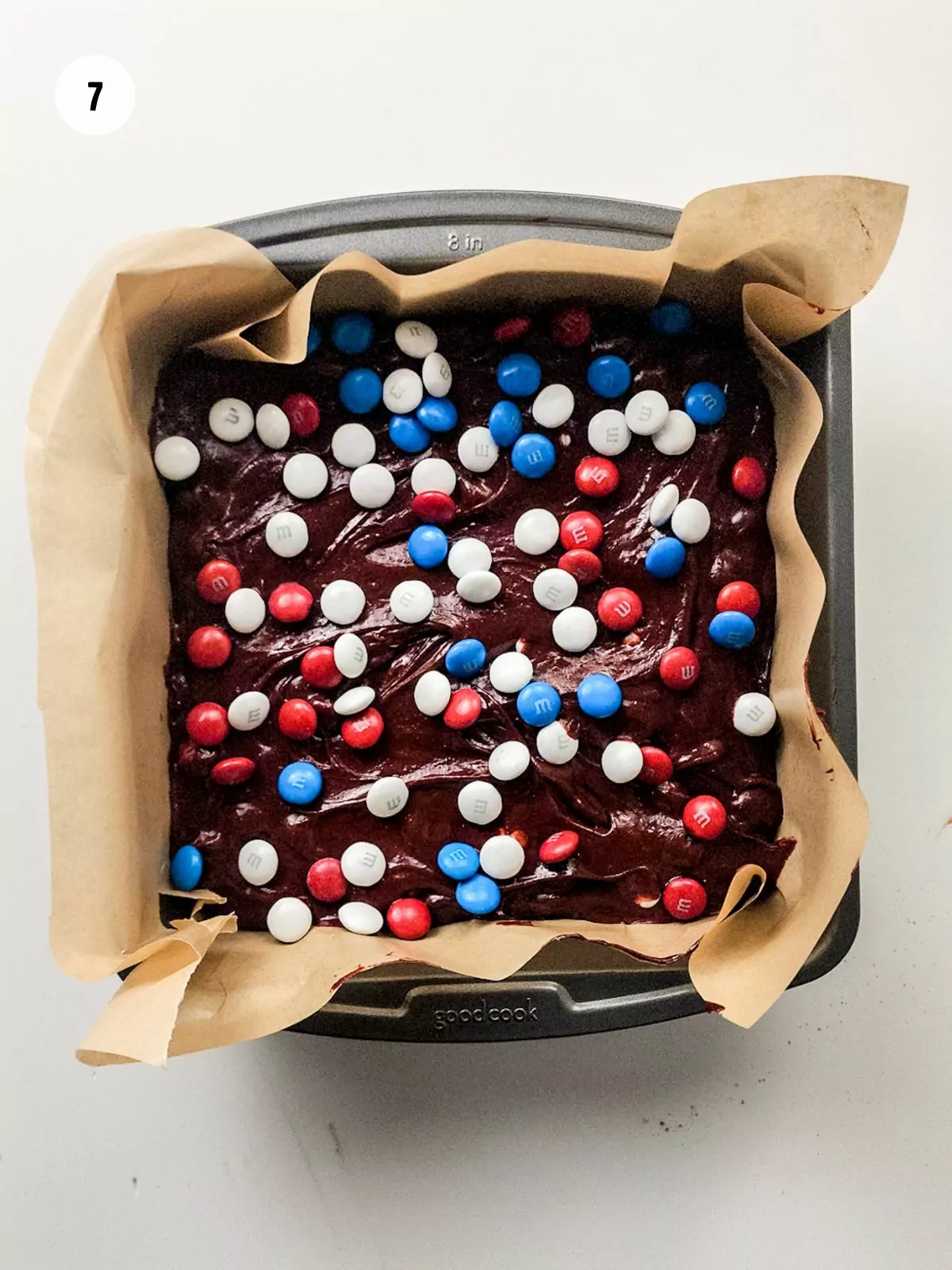 red white and blue m&m's added on top of the brownie batter