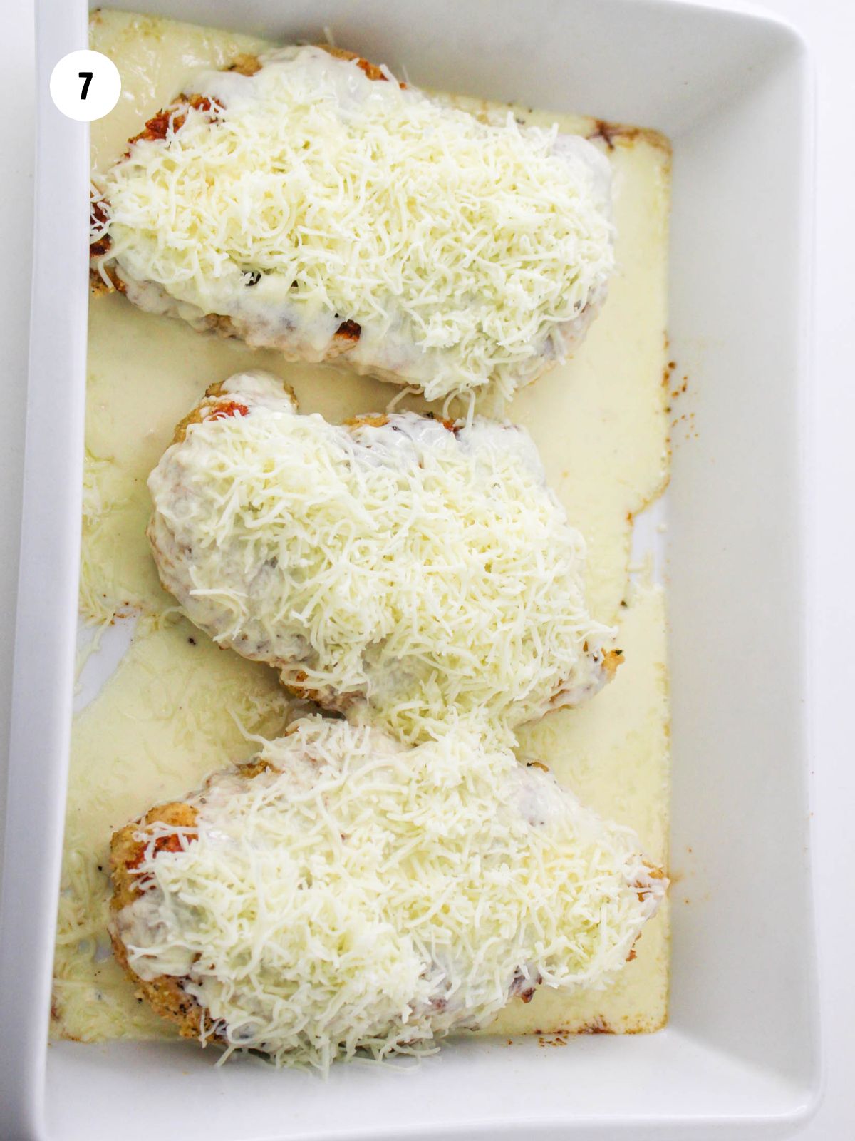 mozzarella cheese added on top of the chicken and alfredo