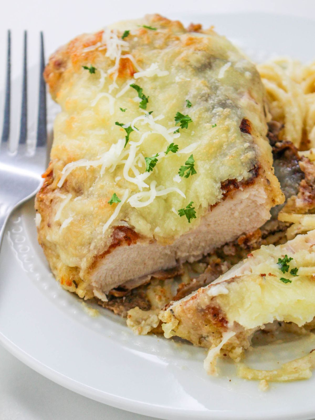 baked cheesy chicken cut into