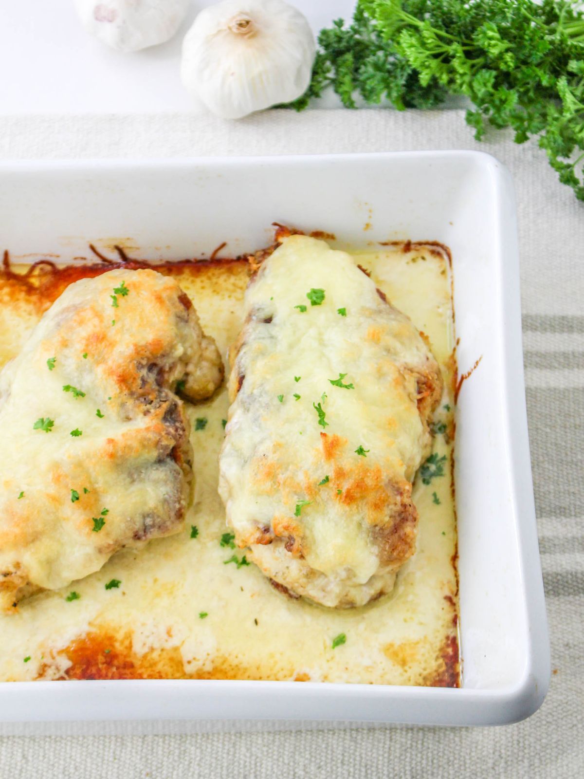 close up of baked chicken alfredo