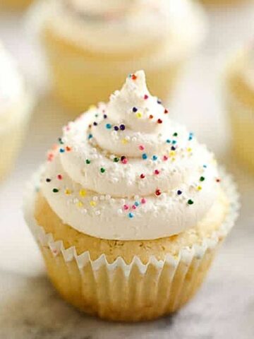 vanilla cupcakes with sprinkles.