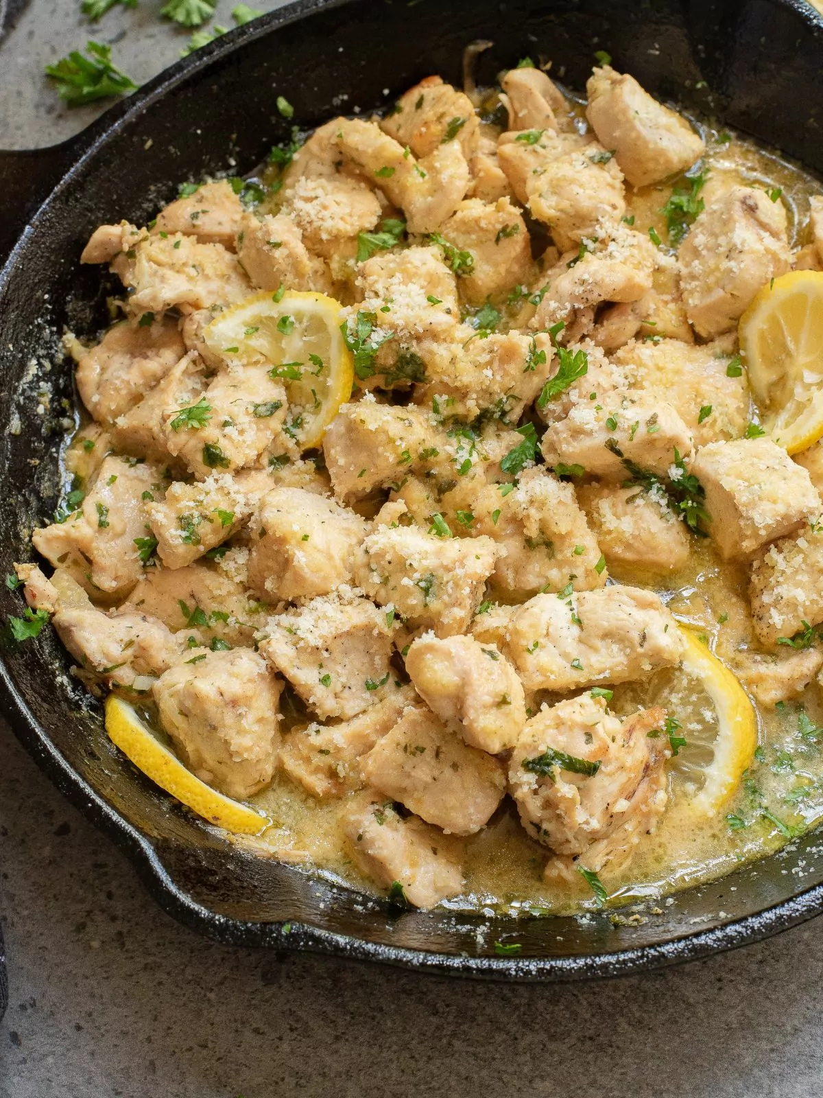 Garlic Chicken Bites served in a cast iron pan