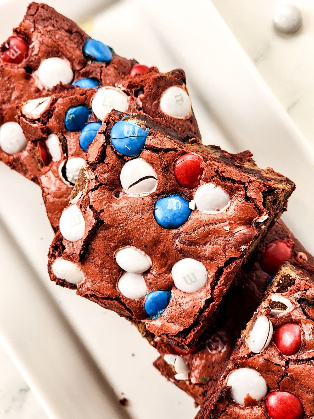 close up of the m&m red velvet brownies