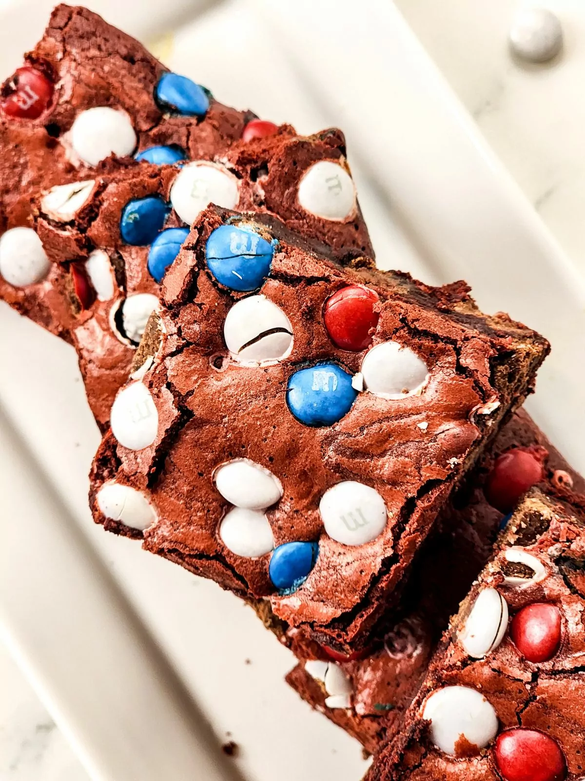 close up of the m&m red velvet brownies