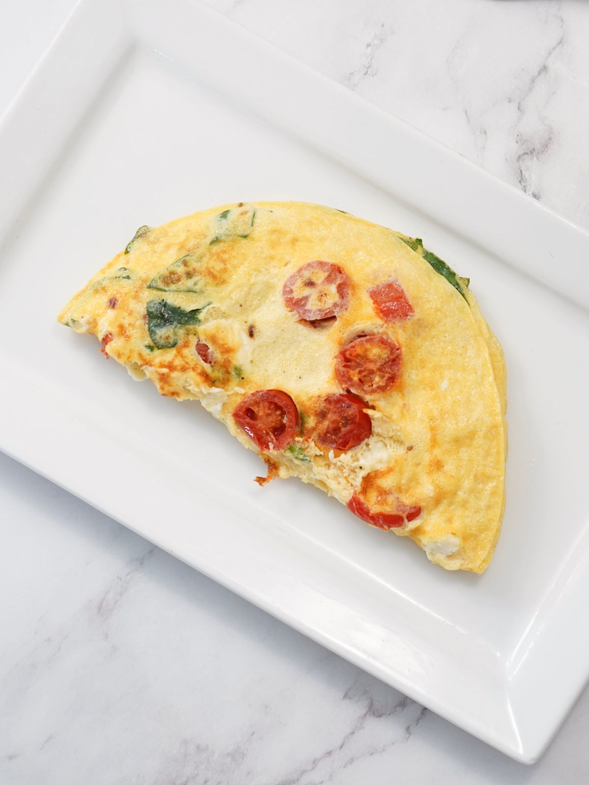 omelette with spinach tomatoes and feta