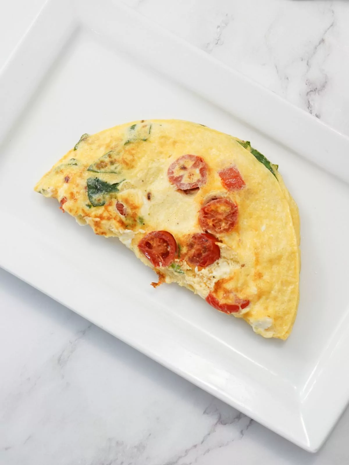 omelette with spinach tomatoes and feta