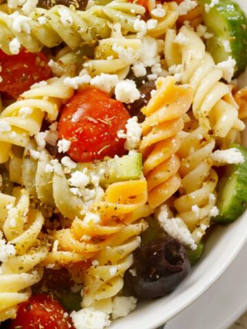 pasta salad in white bowl.