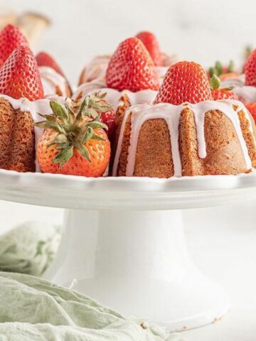 mini strawberry bundt cakes on white cake plate MSN.
