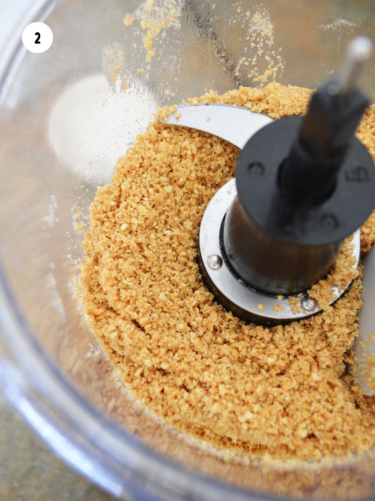 graham cracker crust mixture in food processor