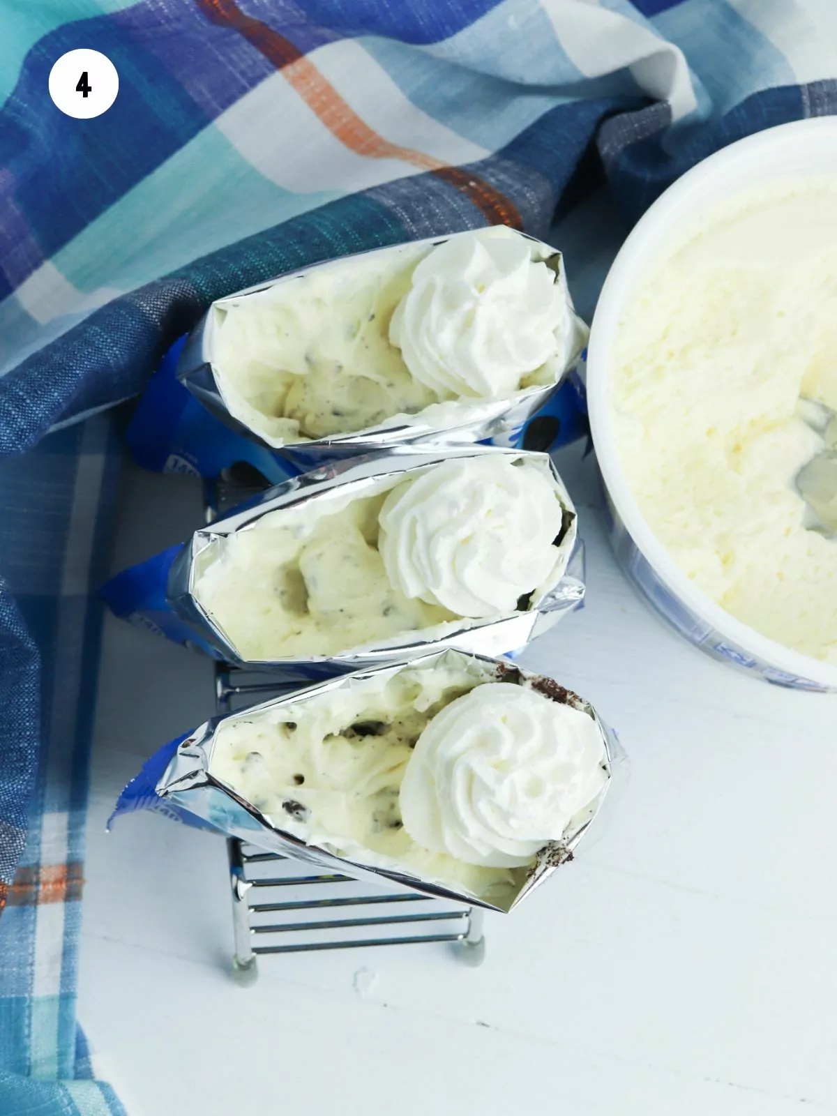 dollop of whipped topping added to the bag