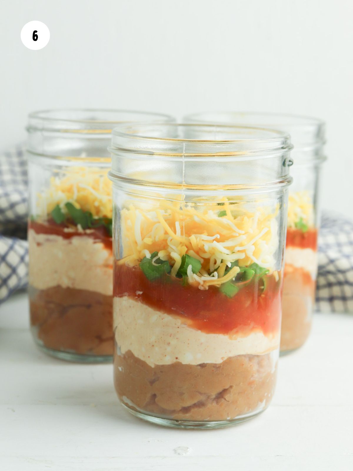 shredded cheese layered on top