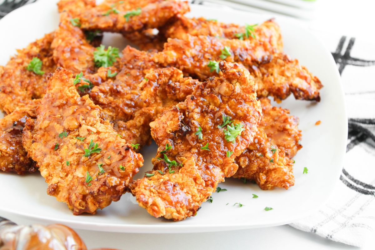 Air fried chicken strips coated in honey bbq.