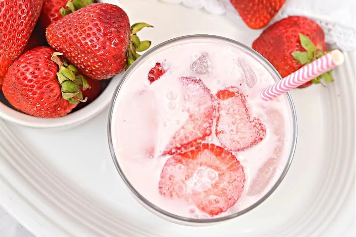 glass of Keto Pink Drink with strawberries