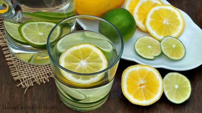 glass of water with lemon and lime
