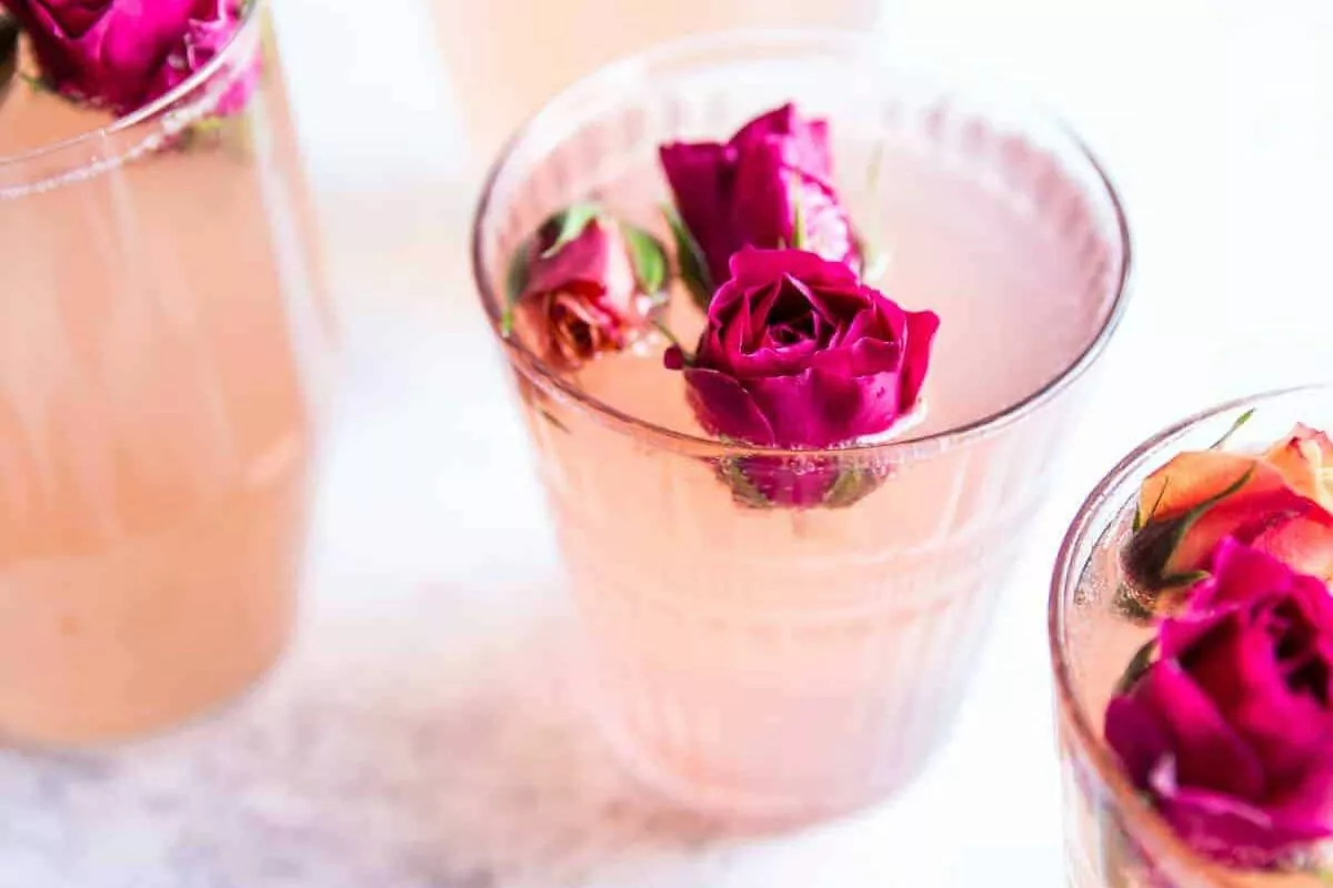 glasses of Rose Lemon Spritzer with rose toppings