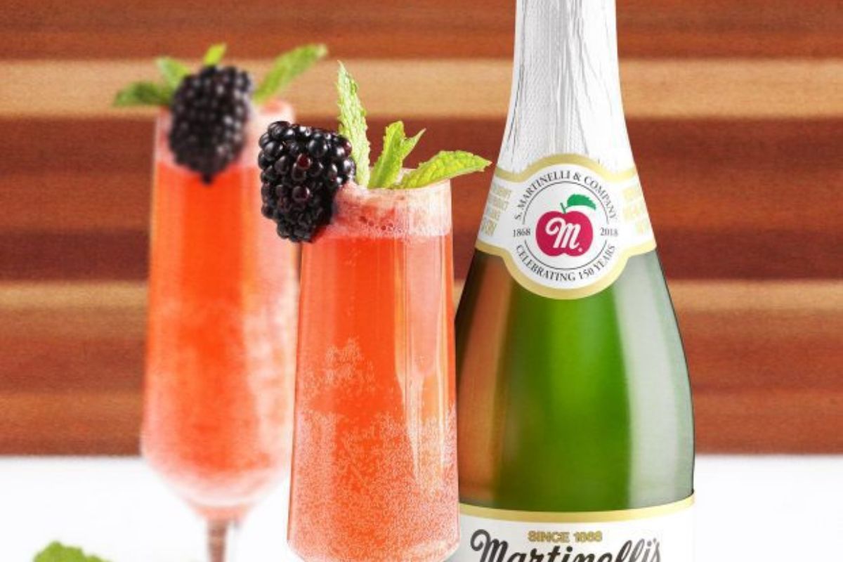 two glass of Sparkling Cider Blackberry Peach Bellini Mocktail