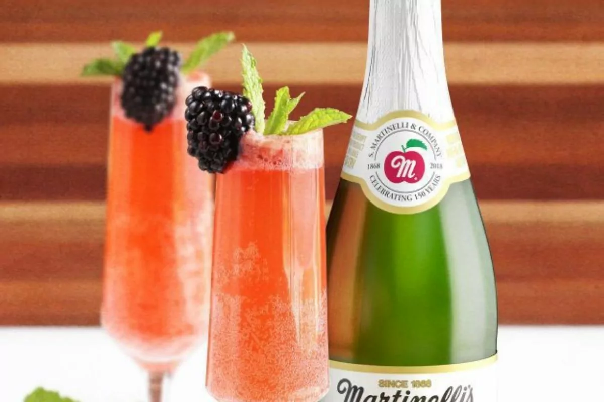 two glass of Sparkling Cider Blackberry Peach Bellini Mocktail