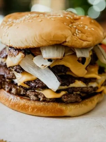 triple grilled smashed burger with onions and cheese MSN.