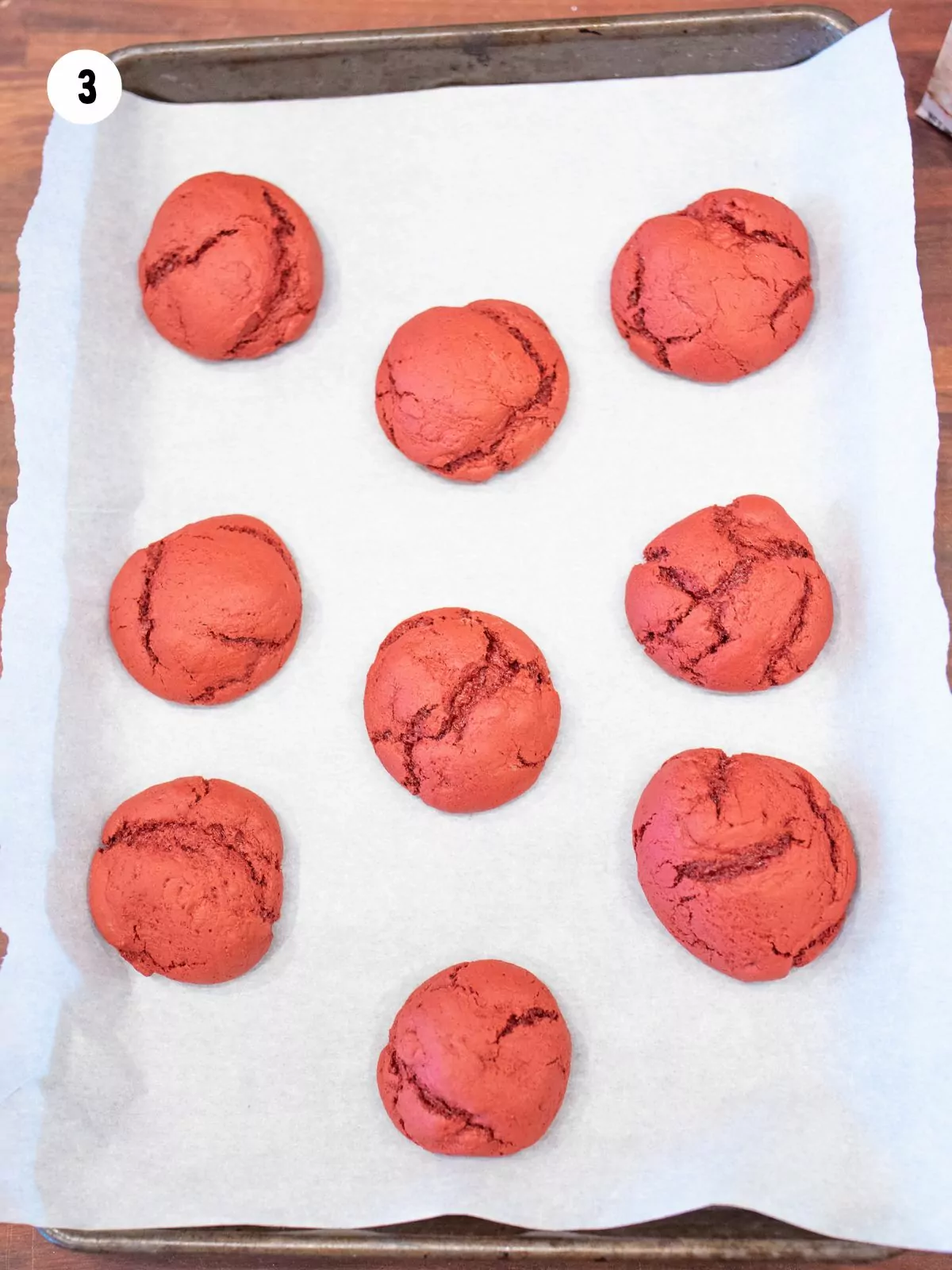 baked cookies on parchment paper lined baking sheet.